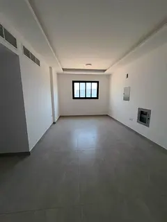 1BR apartment in Al Jurf 3, first occupancy, master bedroom, 2 bathrooms, balcony, central AC, card