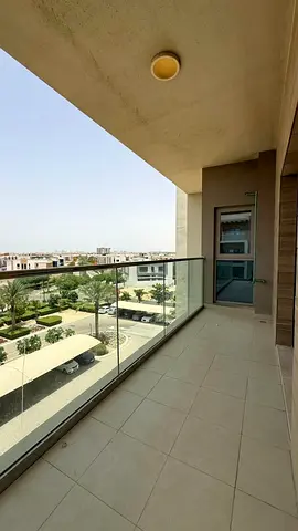 Apartment for annual rent in Al Zahia, Sharjah - Gardens - 2 bedrooms, living room, balcony, gym, swimming pool and free parking, with an area of 15