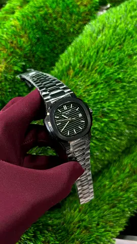 Patek Philippe Mens stainless steel wristwatch with black textured dial