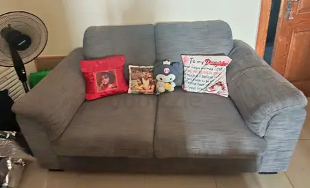Comfortable 2-Seater Grey Fabric Sofa - Good Condition