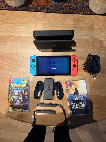 Nintendo Switch V1 Console + 2 Games – Excellent Condition
