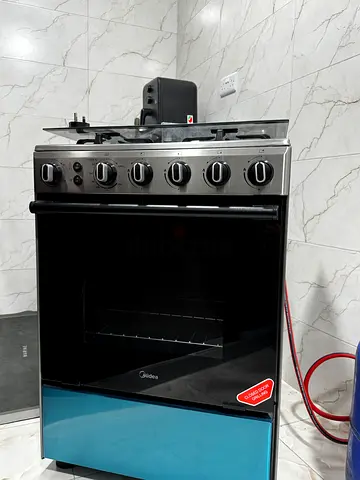 Midea 4-Burner Gas Cooker with Oven - Good Working Condition
