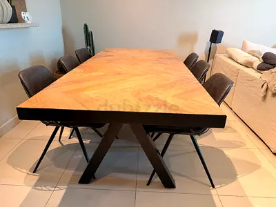 Solid wood chevron dining table with metal X-base — seats 8