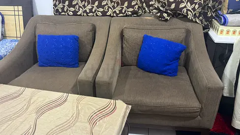 Pair of brown upholstered armchairs- good condition