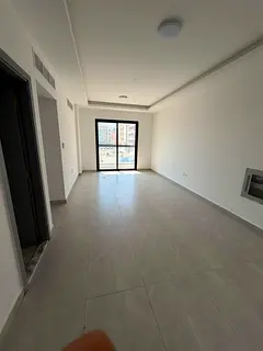2BR apartment in Al Jurf 3, first occupancy, 2 master bedrooms, 3 bathrooms, laundry room, balcony,