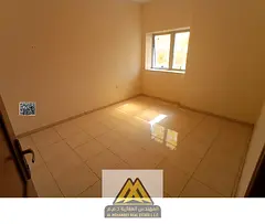 Annual rent: 1-bedroom apartment in Al Nuaimiya 1 with balcony, central AC, free maintenance, near G