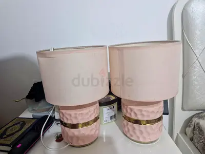 Pair of pink ceramic table lamps with beige shades