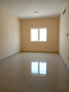 Free parking. Spacious 2-master-bedroom apartment with 3 bathrooms, balcony and central AC in Al Qul