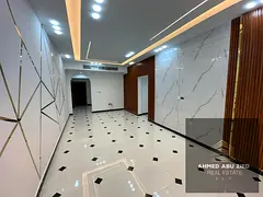 Two ultra-luxurious bedrooms and a living room for annual rent in Al Rawda 3, Ajman; includes two ba
