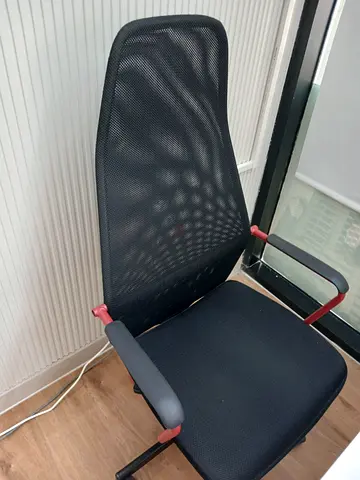 Office Chair with Red Accents - Good Condition is for sale for sale at the price of 50 AED
