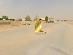 For sale: A walled plot in Old Sajaa, Sharjah, situated between two streets (front and back).