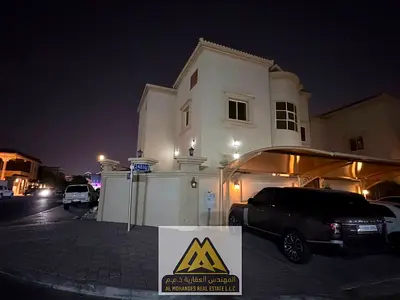 5 master bedrooms Maid's room Dining room Living room and sitting room Two kitchens Roof