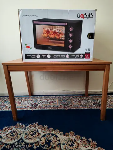 New electric oven +dining table without chairs