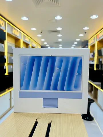 Apple iMac 24-inch (boxed) - M4 - Silver and blue with apple warranty left open box only