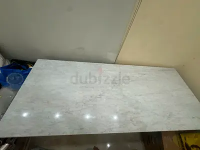 Custom marbled dining table that seats up to 6 people open to negotiate