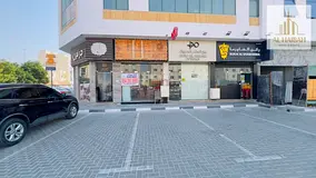 For rent in Muwaileh New Commercial, a shop ready for investment as a restaurant or cafeteria. Very