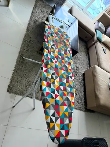 Sturdy Ironing Board with Colorful Cover - Good Condition