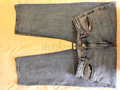Light blue denim loose baggy-leg jeans, worn twice