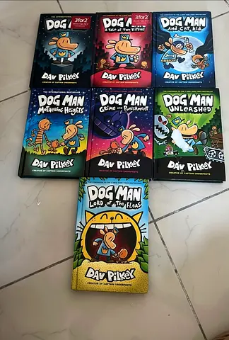 Set of 7 Dog Man graphic novels by Dav Pilkey - like new