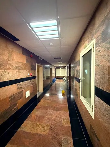 Annual rental apartment in Al Majaz 3, 2 bedrooms + living room, spacious areas, 2 bathrooms, balcony, central AC. AED 40,000 with 4 payments.