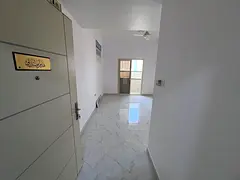 1BR apartment in Al Jurf 3 with balcony, open view, central AC, prime location near services.