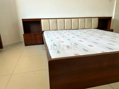 MDF King wooden bed with cushioned headboard with storage and side table
