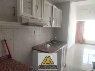 A unique investment and residential opportunity: a semi-detached studio apartment with a kitchen for sale in Al Rashidiya, Pearl Towers.