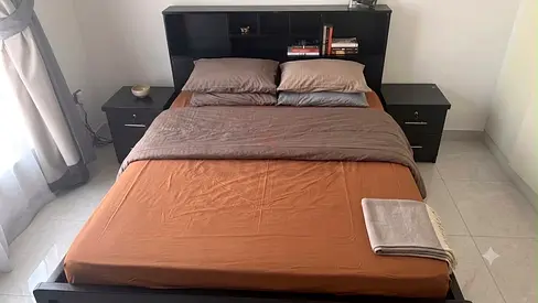 Queen bed frame with headboard and two matching bedside tables - good condition, with mattress