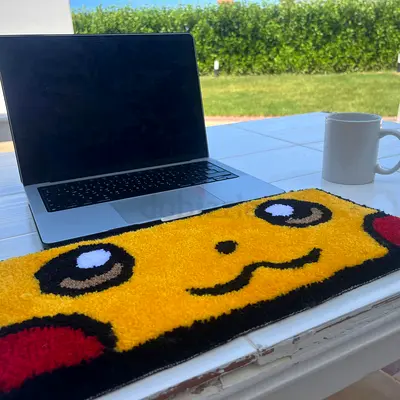 Posting pickachu dest rug on amrketplace need a title the size is 30x12cm