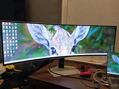 Samsung Odyssey OLED G9 (Model: LS49DG932S) is a 49-inch super ultra-wide curved gaming monitor desi