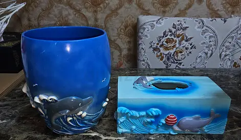 Decorative blue ceramic whale dastbin and matching tissue box