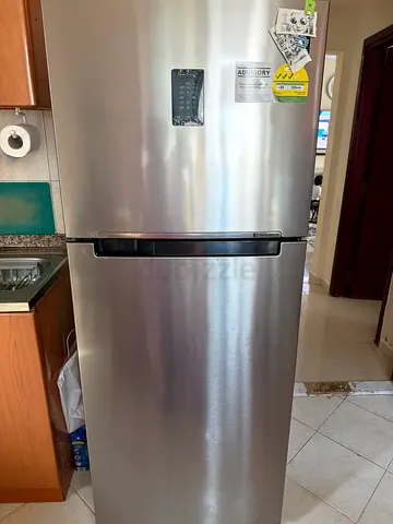 Double-door refrigerator with top freezer - good working condition