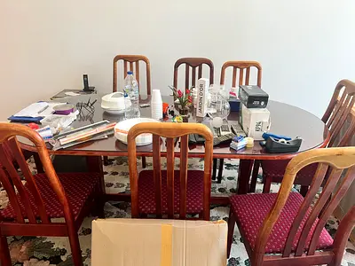 Solid wood dining table with 8 chairs - good condition
