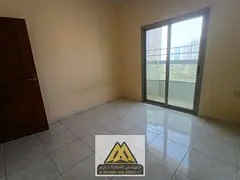 Two bedrooms and a large living room with a balcony overlooking the area of ​​Al Nuaimiya 1, nea