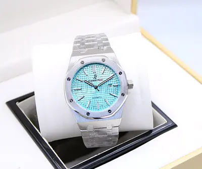 Audemars Piguet Royal Oak style stainless steel watch with turquoise dial