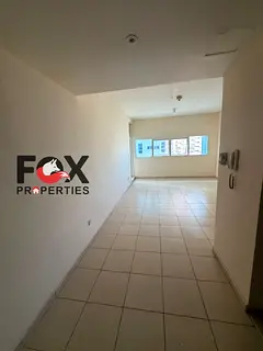 **Cheapest 2BR apartment for sale in Ajman One. 1,450 sqft, balcony, 3 bathrooms, steps from Cornich