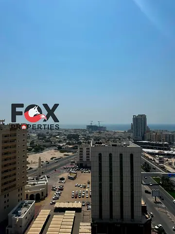 The biggest room and hall for annual rent in Ajman, in the Al Nuaimiya 3 area, with a balcony, central air conditioning, built-in wardrobes,2 bathroom