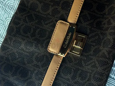 Calvin Klein brown monogram clutch / small handbag