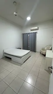 Spacious room with attached balcony and separate bathroom