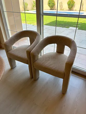 Pair of Beige Bouclé Accent Chairs - Modern Curved Design
