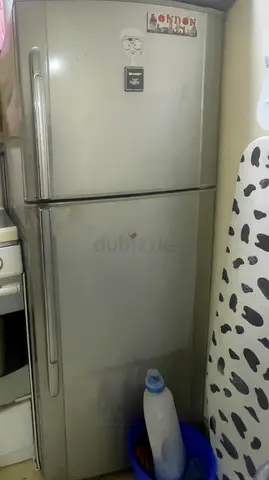 Used top-freezer refrigerator - good working condition
