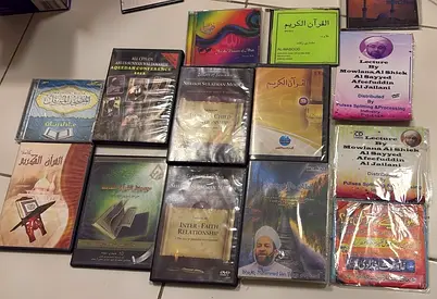 Collection of Islamic lectures and Quran recitations (multiple DVDs/CDs)
