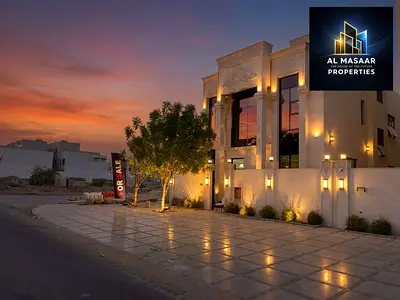 Luxury villa on a corner lot facing the mosque, classic design, price includes registration and ownership fees.
