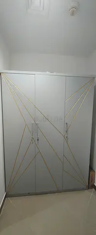 Modern 3-Door Wardrobe + Locker with Geometric Gold Trim - Excellent condition, good as new.