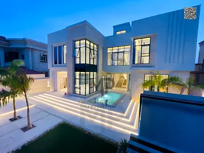 Luxury villa in the most prestigious area of Ajman with a private pool, including electricity, water and air conditioning, for a sophisticated and i