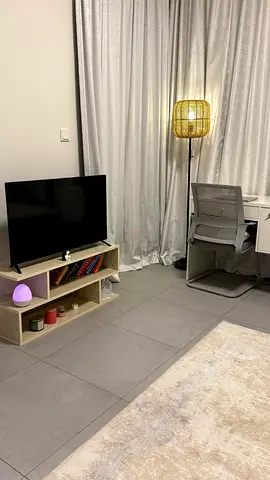 Kogan smart TV and Tv table