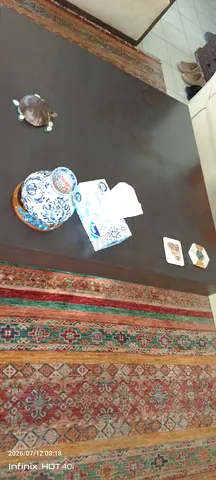 Solid dark wood coffee table in good condition