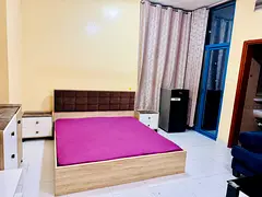 Furnished Master Bedroom with attached bathroom and Balcony Ajman falcon towers