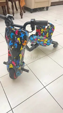 Used 3-Wheel Drifting Scooter / Ride-On for Kids — Colorful Grafitti Design