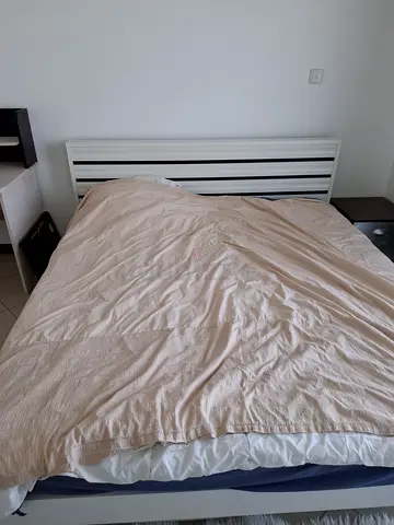 Double bed frame with mattress - simple white slatted headboard